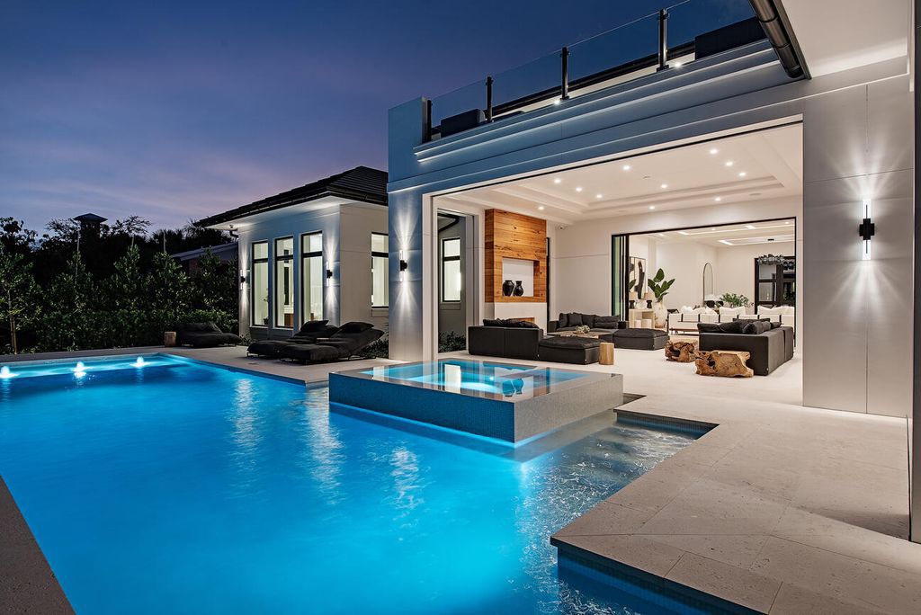 Nestled in the heart of Naples, Florida, 722 16th Ave S embodies the epitome of modern coastal living, seamlessly blending casual elegance with contemporary design. Boasting 5 bedrooms, 7 baths, and 6,224 square feet of living space, this newly constructed masterpiece, meticulously crafted by Falcon Design Inc., BBA Development Inc., and NP Interior Design