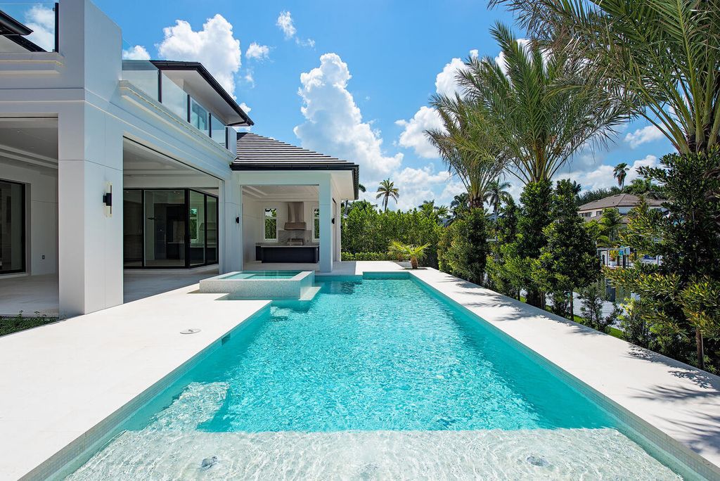 Nestled in the heart of Naples, Florida, 722 16th Ave S embodies the epitome of modern coastal living, seamlessly blending casual elegance with contemporary design. Boasting 5 bedrooms, 7 baths, and 6,224 square feet of living space, this newly constructed masterpiece, meticulously crafted by Falcon Design Inc., BBA Development Inc., and NP Interior Design