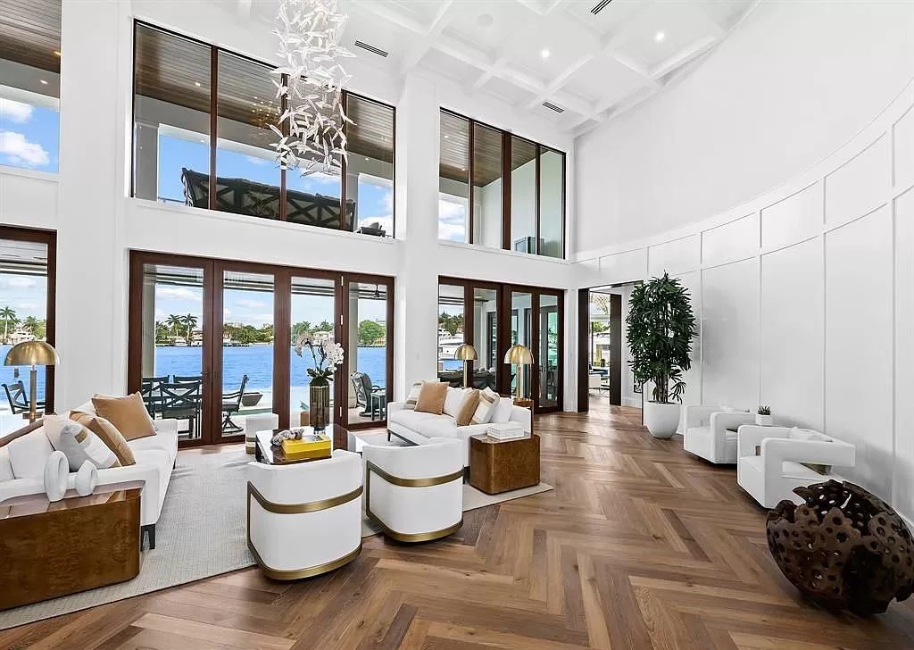 Immerse yourself in the epitome of the "South Florida Lifestyle" at this exquisitely renovated 6-bed, 8-bath West Indies Oasis at 1812 SE 14th St, Fort Lauderdale, FL. This 7,221 sq ft estate boasts a grand Great Room with 20' ceilings and panoramic water views, a media room, and a chef's kitchen with a La’Corneu gas range.