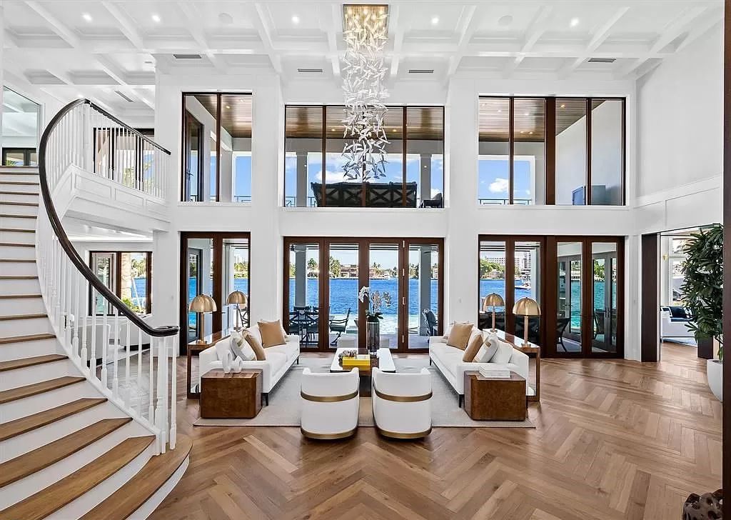 Immerse yourself in the epitome of the "South Florida Lifestyle" at this exquisitely renovated 6-bed, 8-bath West Indies Oasis at 1812 SE 14th St, Fort Lauderdale, FL. This 7,221 sq ft estate boasts a grand Great Room with 20' ceilings and panoramic water views, a media room, and a chef's kitchen with a La’Corneu gas range.