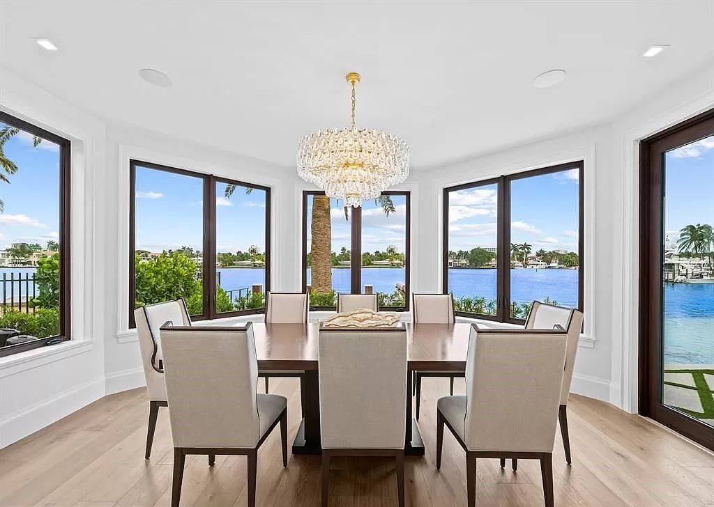 Immerse yourself in the epitome of the "South Florida Lifestyle" at this exquisitely renovated 6-bed, 8-bath West Indies Oasis at 1812 SE 14th St, Fort Lauderdale, FL. This 7,221 sq ft estate boasts a grand Great Room with 20' ceilings and panoramic water views, a media room, and a chef's kitchen with a La’Corneu gas range.