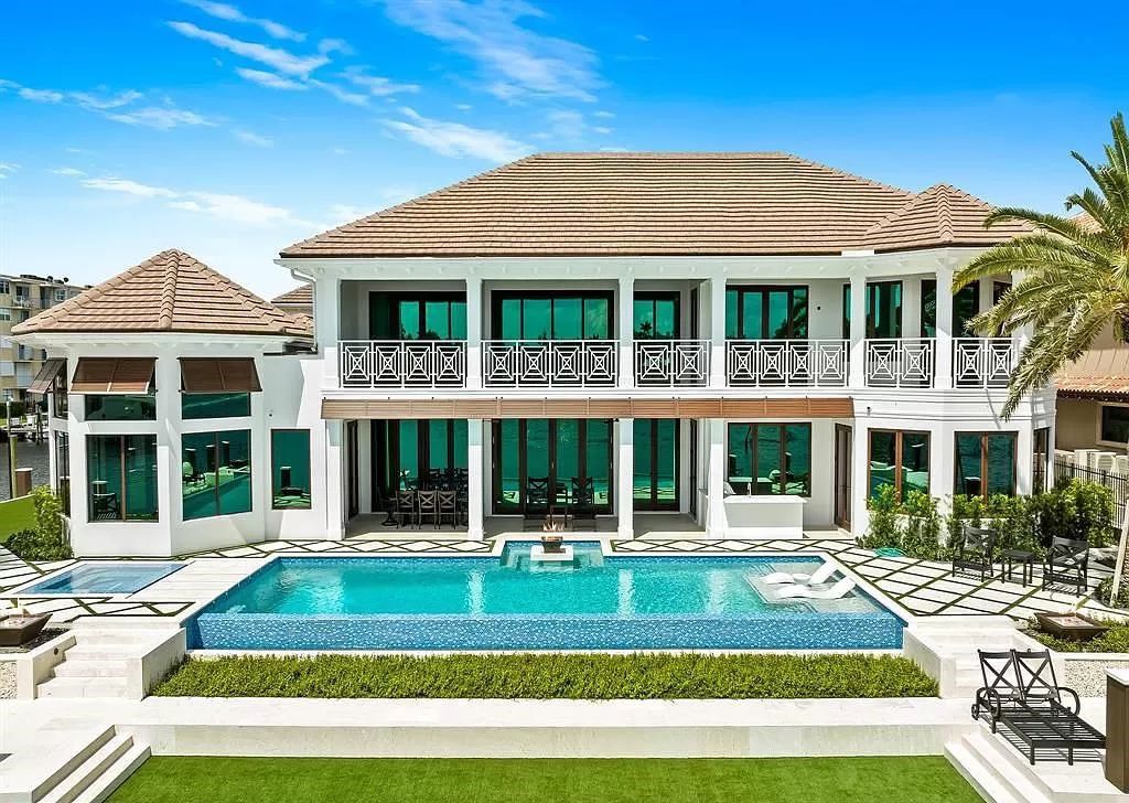 Immerse yourself in the epitome of the "South Florida Lifestyle" at this exquisitely renovated 6-bed, 8-bath West Indies Oasis at 1812 SE 14th St, Fort Lauderdale, FL. This 7,221 sq ft estate boasts a grand Great Room with 20' ceilings and panoramic water views, a media room, and a chef's kitchen with a La’Corneu gas range.