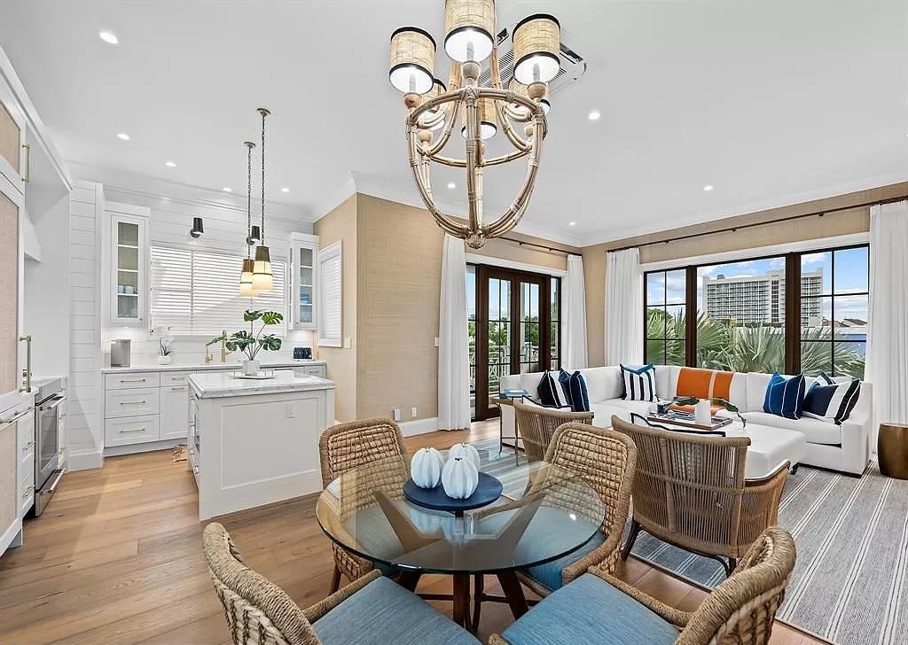 Immerse yourself in the epitome of the "South Florida Lifestyle" at this exquisitely renovated 6-bed, 8-bath West Indies Oasis at 1812 SE 14th St, Fort Lauderdale, FL. This 7,221 sq ft estate boasts a grand Great Room with 20' ceilings and panoramic water views, a media room, and a chef's kitchen with a La’Corneu gas range.