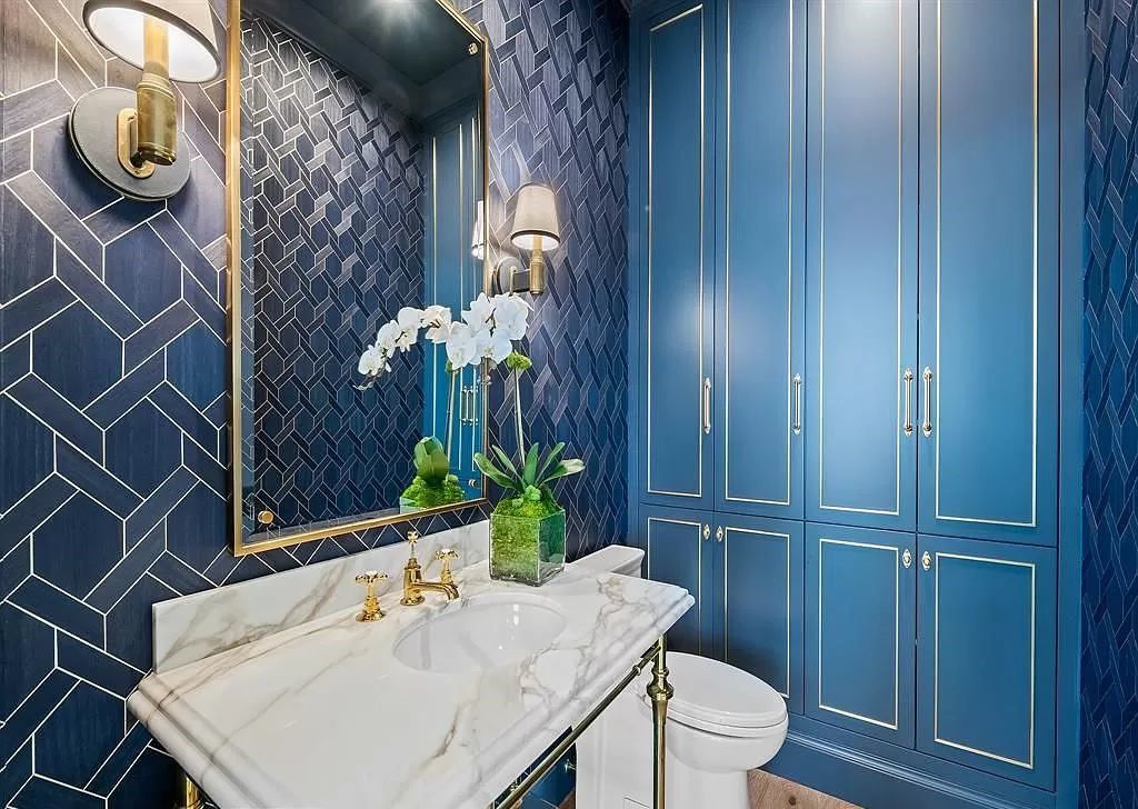 Immerse yourself in the epitome of the "South Florida Lifestyle" at this exquisitely renovated 6-bed, 8-bath West Indies Oasis at 1812 SE 14th St, Fort Lauderdale, FL. This 7,221 sq ft estate boasts a grand Great Room with 20' ceilings and panoramic water views, a media room, and a chef's kitchen with a La’Corneu gas range.