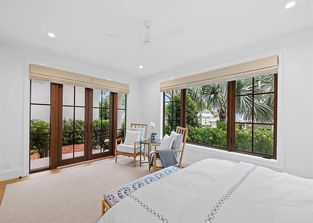 Immerse yourself in the epitome of the "South Florida Lifestyle" at this exquisitely renovated 6-bed, 8-bath West Indies Oasis at 1812 SE 14th St, Fort Lauderdale, FL. This 7,221 sq ft estate boasts a grand Great Room with 20' ceilings and panoramic water views, a media room, and a chef's kitchen with a La’Corneu gas range.