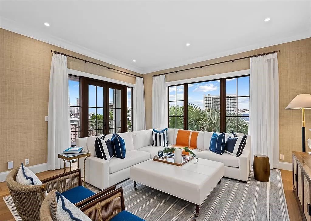 Immerse yourself in the epitome of the "South Florida Lifestyle" at this exquisitely renovated 6-bed, 8-bath West Indies Oasis at 1812 SE 14th St, Fort Lauderdale, FL. This 7,221 sq ft estate boasts a grand Great Room with 20' ceilings and panoramic water views, a media room, and a chef's kitchen with a La’Corneu gas range.