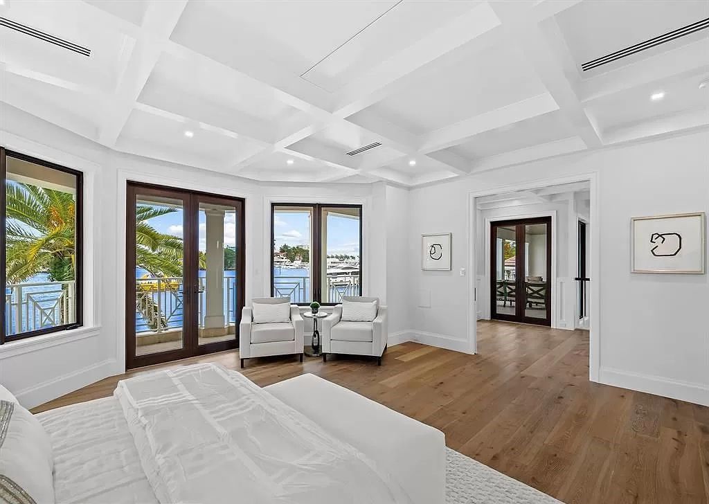Immerse yourself in the epitome of the "South Florida Lifestyle" at this exquisitely renovated 6-bed, 8-bath West Indies Oasis at 1812 SE 14th St, Fort Lauderdale, FL. This 7,221 sq ft estate boasts a grand Great Room with 20' ceilings and panoramic water views, a media room, and a chef's kitchen with a La’Corneu gas range.