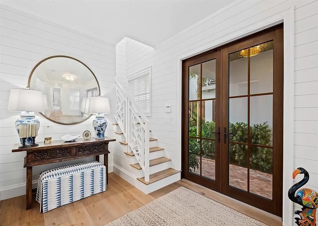 Immerse yourself in the epitome of the "South Florida Lifestyle" at this exquisitely renovated 6-bed, 8-bath West Indies Oasis at 1812 SE 14th St, Fort Lauderdale, FL. This 7,221 sq ft estate boasts a grand Great Room with 20' ceilings and panoramic water views, a media room, and a chef's kitchen with a La’Corneu gas range.