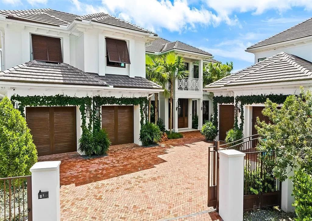 Immerse yourself in the epitome of the "South Florida Lifestyle" at this exquisitely renovated 6-bed, 8-bath West Indies Oasis at 1812 SE 14th St, Fort Lauderdale, FL. This 7,221 sq ft estate boasts a grand Great Room with 20' ceilings and panoramic water views, a media room, and a chef's kitchen with a La’Corneu gas range.