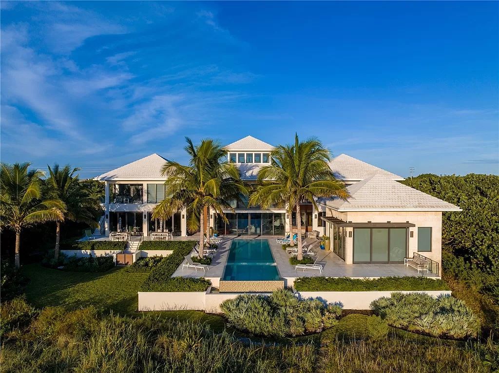This modern oceanfront estate, located at 6600 N Highway A1a, Hutchinson Island, Florida, spans 1.5 acres and offers unparalleled privacy. With 149 glass windows and doors, it seamlessly blends stone, wood, and glass, creating a masterpiece of luxury and tranquility.