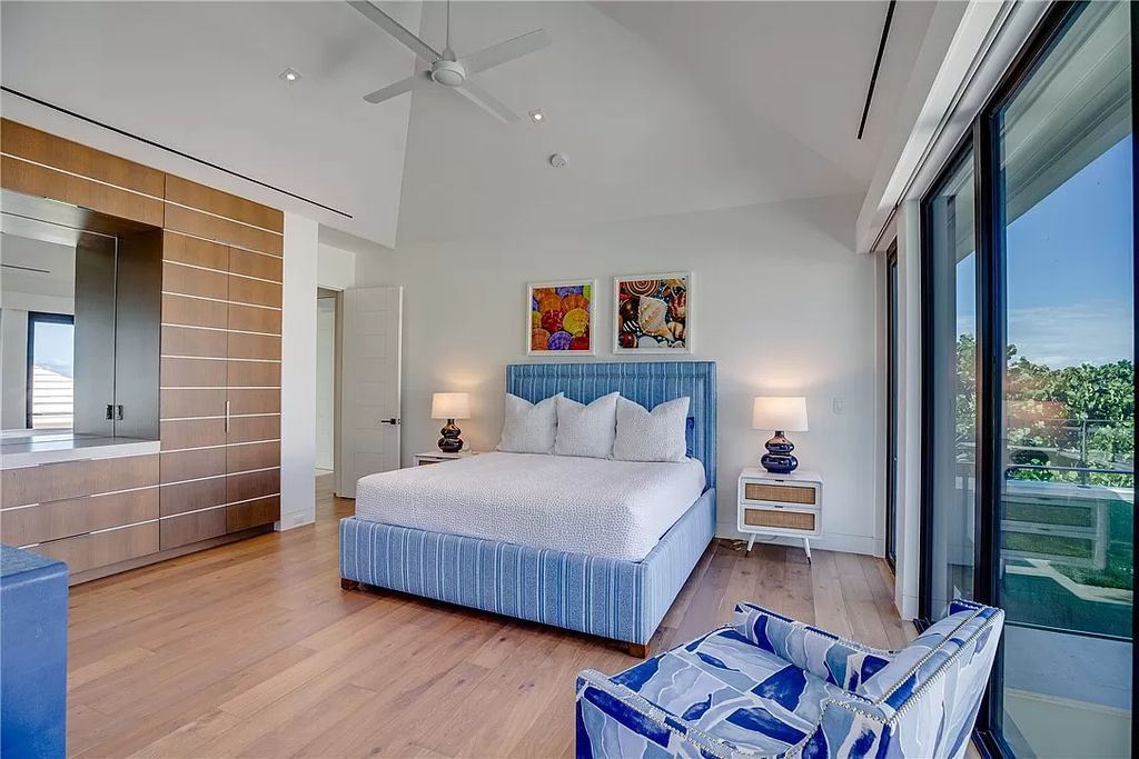 This modern oceanfront estate, located at 6600 N Highway A1a, Hutchinson Island, Florida, spans 1.5 acres and offers unparalleled privacy. With 149 glass windows and doors, it seamlessly blends stone, wood, and glass, creating a masterpiece of luxury and tranquility.