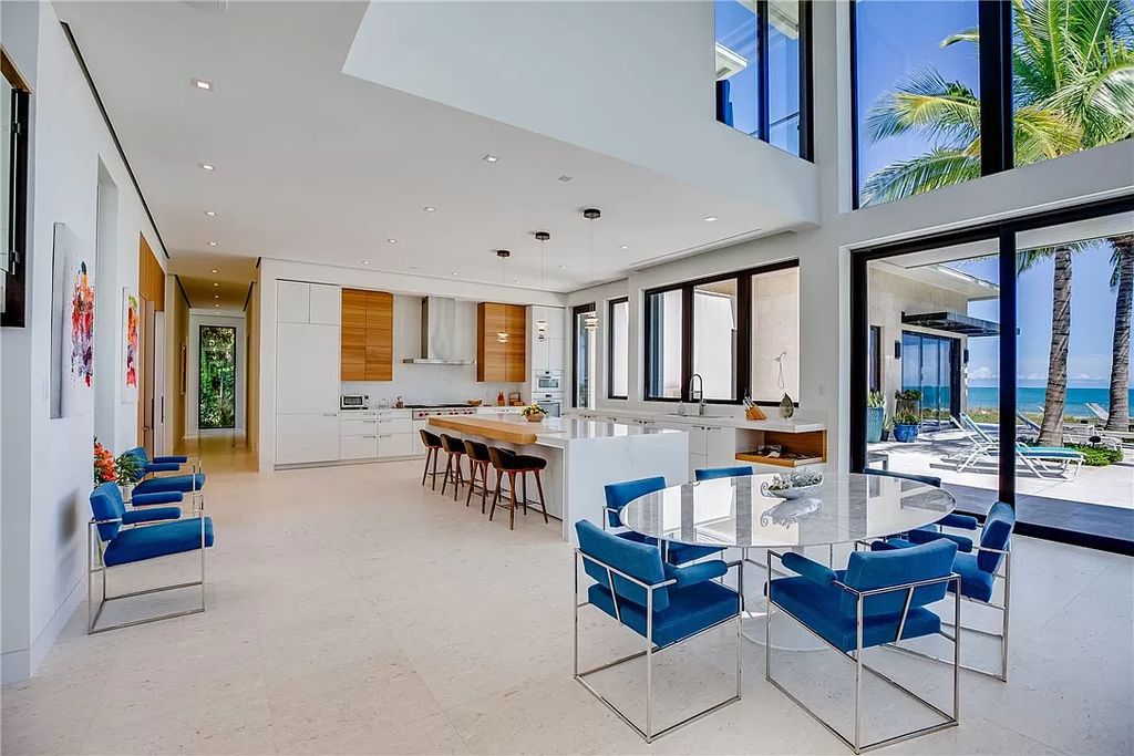 This modern oceanfront estate, located at 6600 N Highway A1a, Hutchinson Island, Florida, spans 1.5 acres and offers unparalleled privacy. With 149 glass windows and doors, it seamlessly blends stone, wood, and glass, creating a masterpiece of luxury and tranquility.
