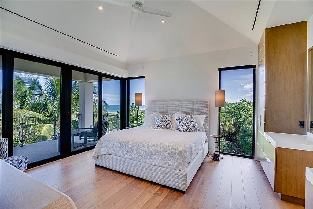 This modern oceanfront estate, located at 6600 N Highway A1a, Hutchinson Island, Florida, spans 1.5 acres and offers unparalleled privacy. With 149 glass windows and doors, it seamlessly blends stone, wood, and glass, creating a masterpiece of luxury and tranquility.