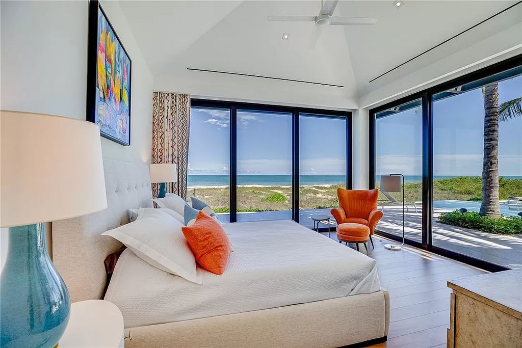 This modern oceanfront estate, located at 6600 N Highway A1a, Hutchinson Island, Florida, spans 1.5 acres and offers unparalleled privacy. With 149 glass windows and doors, it seamlessly blends stone, wood, and glass, creating a masterpiece of luxury and tranquility.