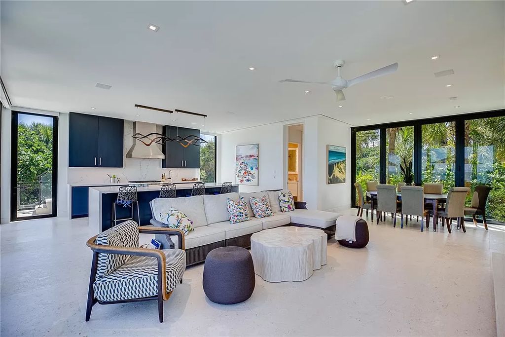 This modern oceanfront estate, located at 6600 N Highway A1a, Hutchinson Island, Florida, spans 1.5 acres and offers unparalleled privacy. With 149 glass windows and doors, it seamlessly blends stone, wood, and glass, creating a masterpiece of luxury and tranquility.