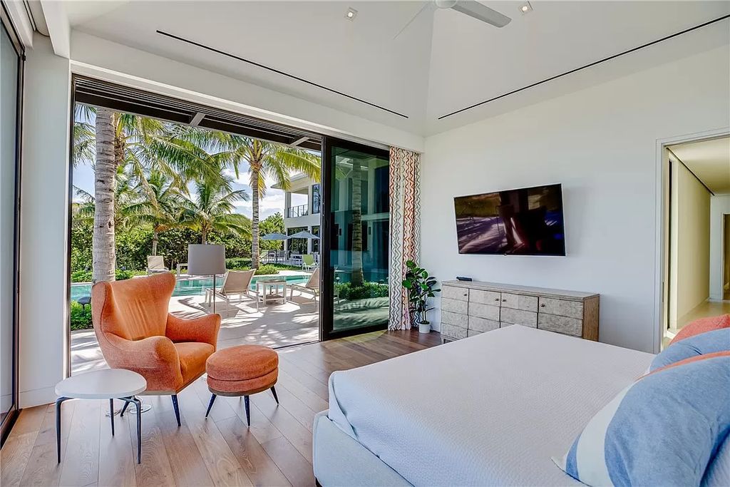 This modern oceanfront estate, located at 6600 N Highway A1a, Hutchinson Island, Florida, spans 1.5 acres and offers unparalleled privacy. With 149 glass windows and doors, it seamlessly blends stone, wood, and glass, creating a masterpiece of luxury and tranquility.