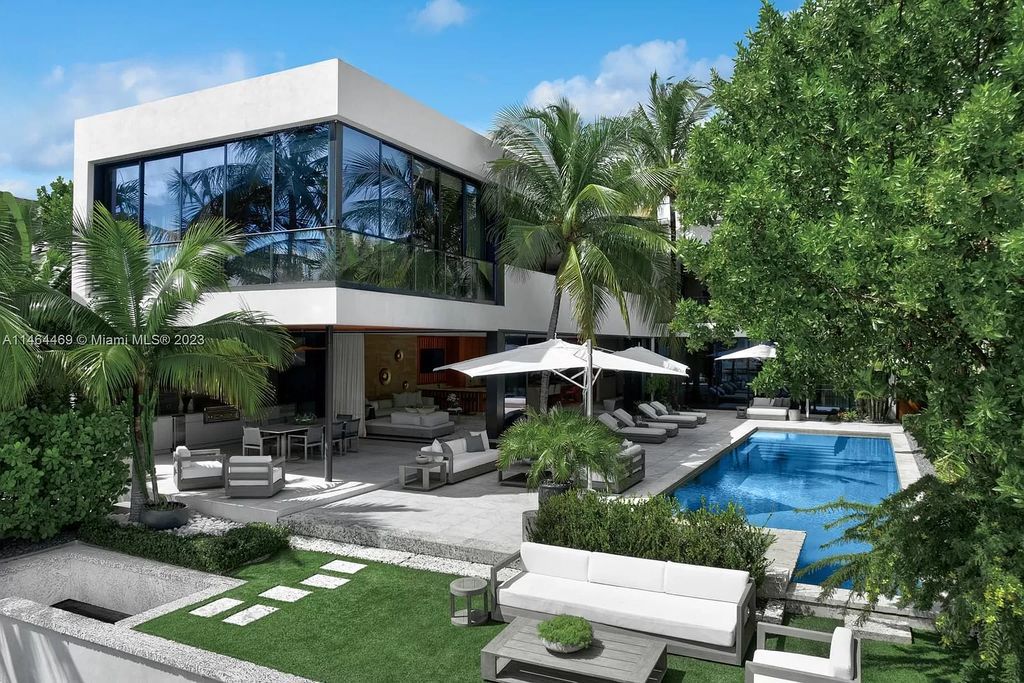 Discover the pinnacle of Miami Beach luxury living at 1142 N Venetian Dr, FL 33139. This 6-bedroom, 6-bath residence spans 6,685 sqft, boasting a seamless blend of contemporary design and comfort. Nestled on the soon-to-be exclusive gated section of the Venetian Islands, this home offers a louvered dining area, media lounge, suede-paneled living salon, and an expansive teak kitchen with Miele & SubZero appliances.