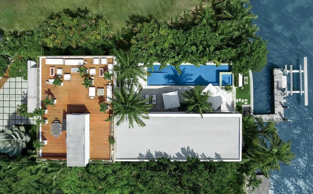 Discover the pinnacle of Miami Beach luxury living at 1142 N Venetian Dr, FL 33139. This 6-bedroom, 6-bath residence spans 6,685 sqft, boasting a seamless blend of contemporary design and comfort. Nestled on the soon-to-be exclusive gated section of the Venetian Islands, this home offers a louvered dining area, media lounge, suede-paneled living salon, and an expansive teak kitchen with Miele & SubZero appliances.