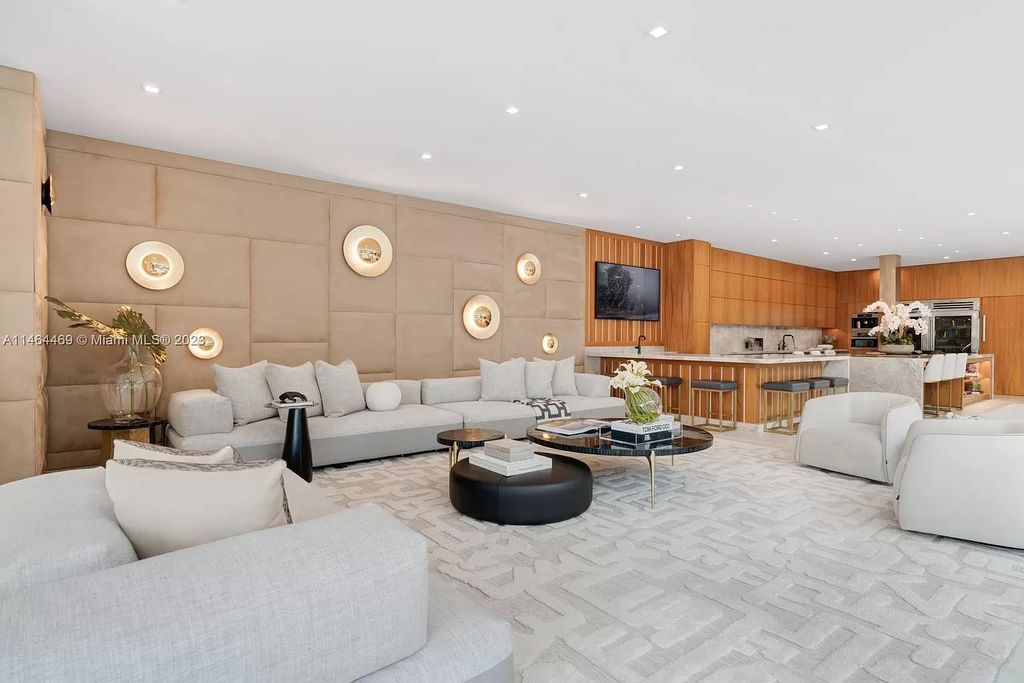 Discover the pinnacle of Miami Beach luxury living at 1142 N Venetian Dr, FL 33139. This 6-bedroom, 6-bath residence spans 6,685 sqft, boasting a seamless blend of contemporary design and comfort. Nestled on the soon-to-be exclusive gated section of the Venetian Islands, this home offers a louvered dining area, media lounge, suede-paneled living salon, and an expansive teak kitchen with Miele & SubZero appliances.