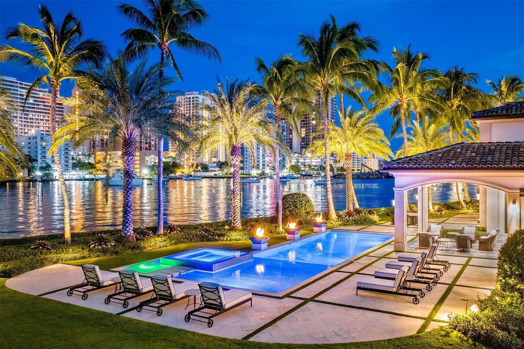 Discover the epitome of luxury waterfront living in this exceptional 6-bedroom, 8-bathroom estate at 2724 Sea Island Dr, Fort Lauderdale. Located in the prestigious Seven Isles neighborhood, this half-acre double lot showcases two pools, covered outdoor spaces, and 325 feet of southeast-exposure waterfront.