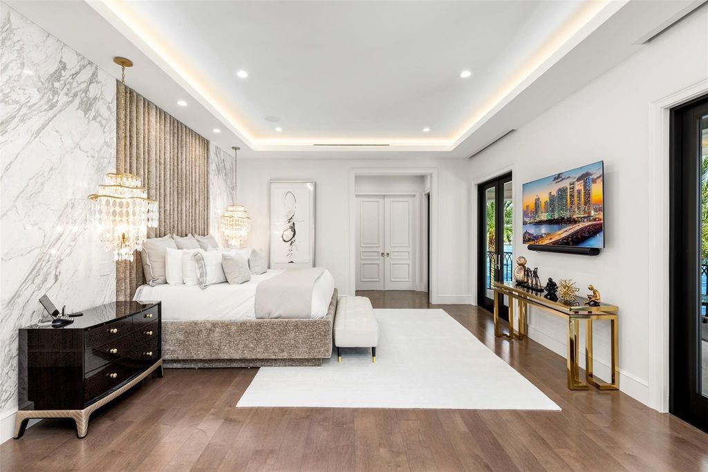 Discover the epitome of luxury waterfront living in this exceptional 6-bedroom, 8-bathroom estate at 2724 Sea Island Dr, Fort Lauderdale. Located in the prestigious Seven Isles neighborhood, this half-acre double lot showcases two pools, covered outdoor spaces, and 325 feet of southeast-exposure waterfront.