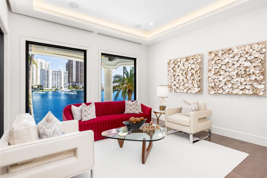 Discover the epitome of luxury waterfront living in this exceptional 6-bedroom, 8-bathroom estate at 2724 Sea Island Dr, Fort Lauderdale. Located in the prestigious Seven Isles neighborhood, this half-acre double lot showcases two pools, covered outdoor spaces, and 325 feet of southeast-exposure waterfront.