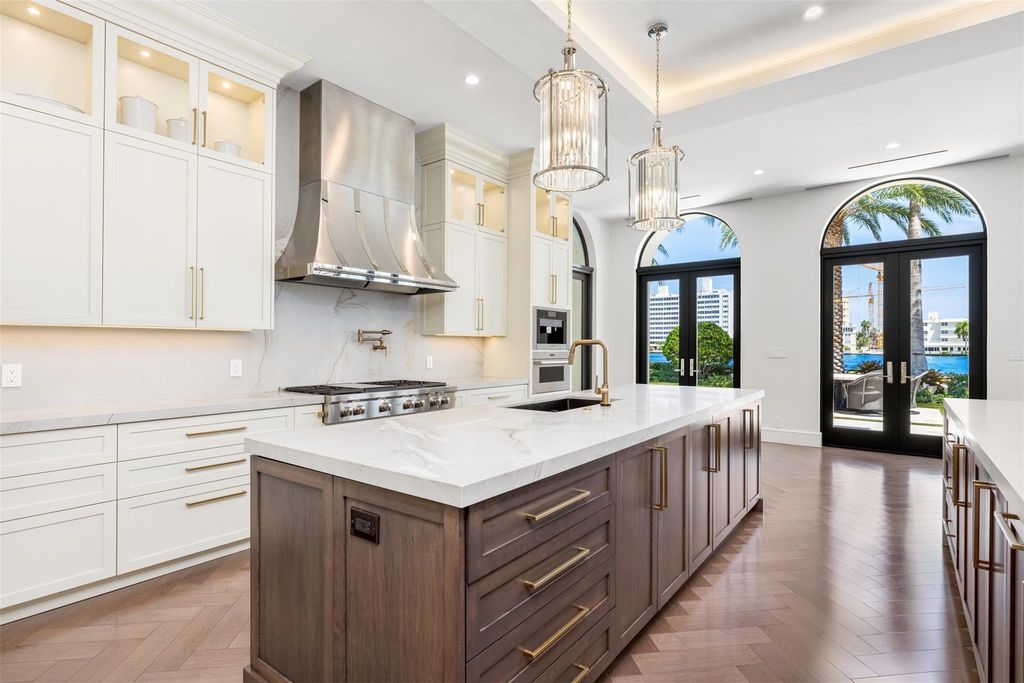 Discover the epitome of luxury waterfront living in this exceptional 6-bedroom, 8-bathroom estate at 2724 Sea Island Dr, Fort Lauderdale. Located in the prestigious Seven Isles neighborhood, this half-acre double lot showcases two pools, covered outdoor spaces, and 325 feet of southeast-exposure waterfront.