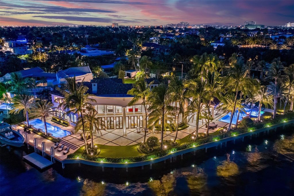 Discover the epitome of luxury waterfront living in this exceptional 6-bedroom, 8-bathroom estate at 2724 Sea Island Dr, Fort Lauderdale. Located in the prestigious Seven Isles neighborhood, this half-acre double lot showcases two pools, covered outdoor spaces, and 325 feet of southeast-exposure waterfront.