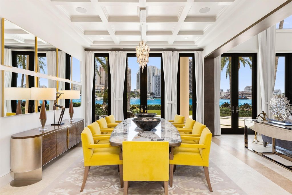 Discover the epitome of luxury waterfront living in this exceptional 6-bedroom, 8-bathroom estate at 2724 Sea Island Dr, Fort Lauderdale. Located in the prestigious Seven Isles neighborhood, this half-acre double lot showcases two pools, covered outdoor spaces, and 325 feet of southeast-exposure waterfront.