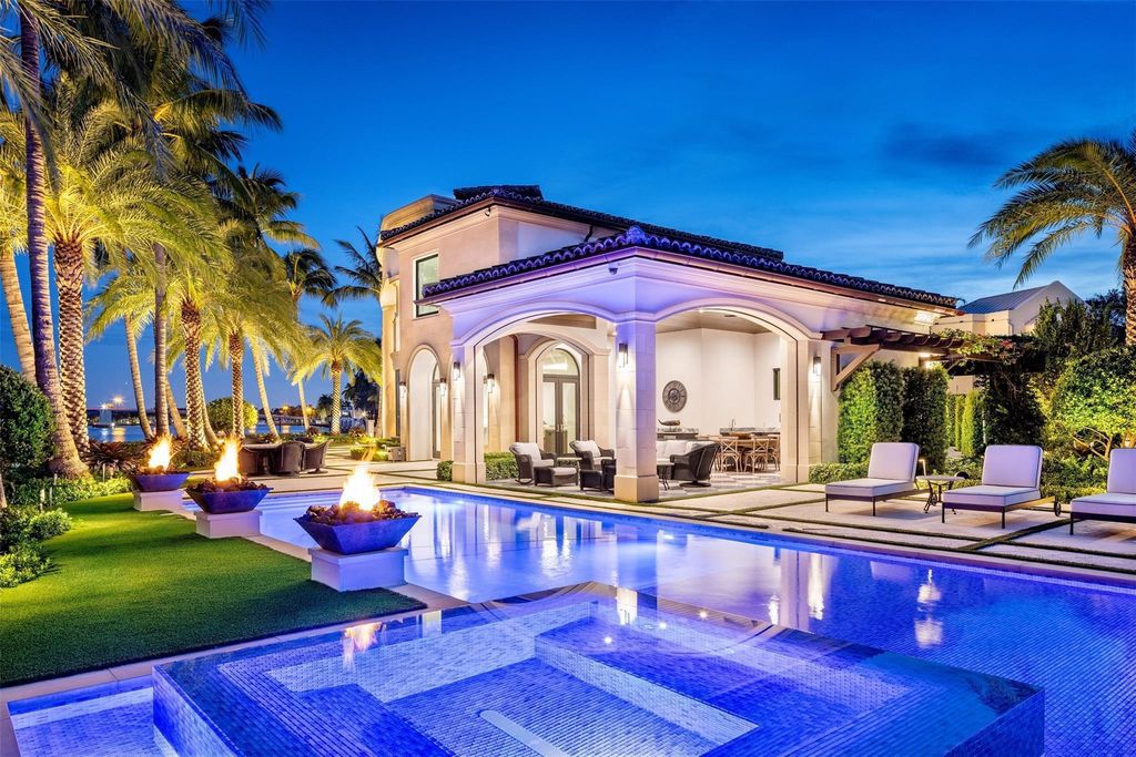 Discover the epitome of luxury waterfront living in this exceptional 6-bedroom, 8-bathroom estate at 2724 Sea Island Dr, Fort Lauderdale. Located in the prestigious Seven Isles neighborhood, this half-acre double lot showcases two pools, covered outdoor spaces, and 325 feet of southeast-exposure waterfront.