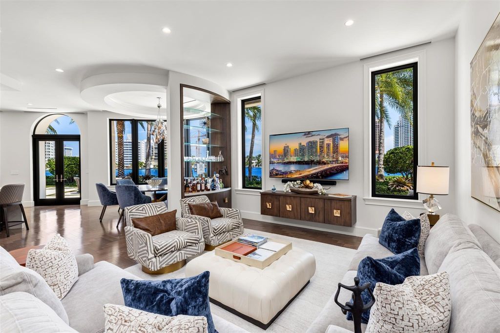 Discover the epitome of luxury waterfront living in this exceptional 6-bedroom, 8-bathroom estate at 2724 Sea Island Dr, Fort Lauderdale. Located in the prestigious Seven Isles neighborhood, this half-acre double lot showcases two pools, covered outdoor spaces, and 325 feet of southeast-exposure waterfront.