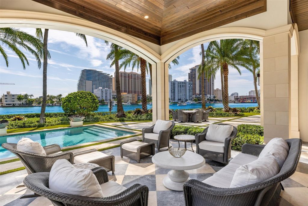 Discover the epitome of luxury waterfront living in this exceptional 6-bedroom, 8-bathroom estate at 2724 Sea Island Dr, Fort Lauderdale. Located in the prestigious Seven Isles neighborhood, this half-acre double lot showcases two pools, covered outdoor spaces, and 325 feet of southeast-exposure waterfront.