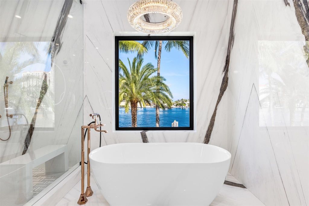 Discover the epitome of luxury waterfront living in this exceptional 6-bedroom, 8-bathroom estate at 2724 Sea Island Dr, Fort Lauderdale. Located in the prestigious Seven Isles neighborhood, this half-acre double lot showcases two pools, covered outdoor spaces, and 325 feet of southeast-exposure waterfront.