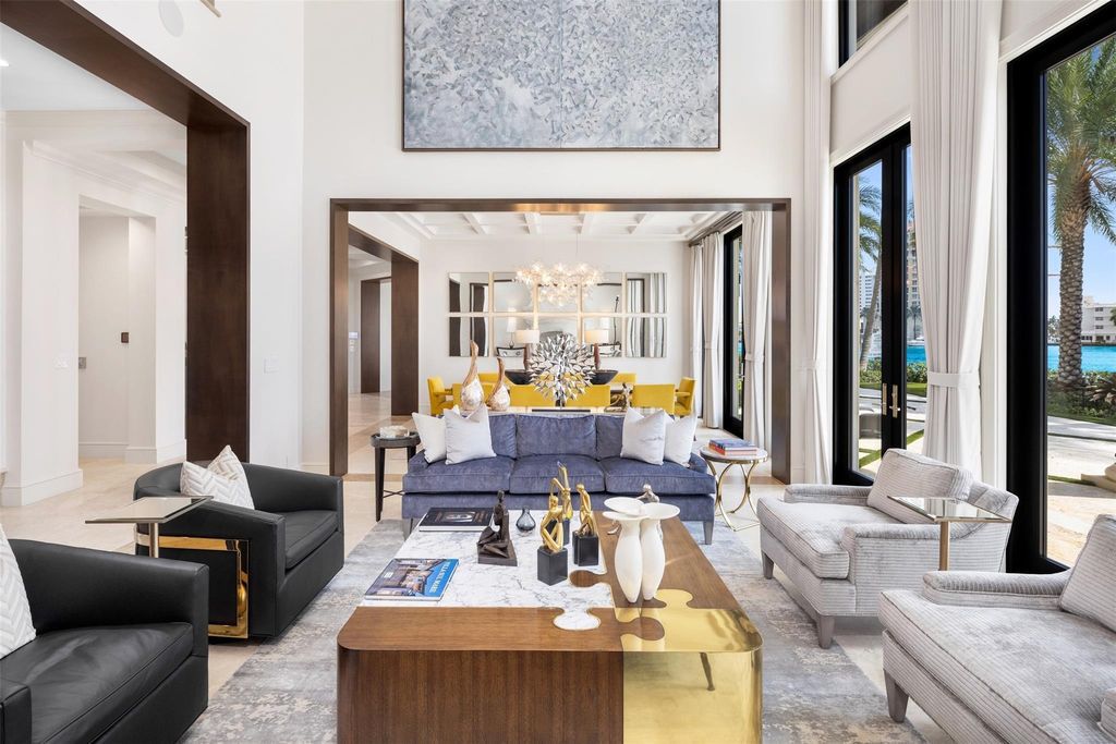 Discover the epitome of luxury waterfront living in this exceptional 6-bedroom, 8-bathroom estate at 2724 Sea Island Dr, Fort Lauderdale. Located in the prestigious Seven Isles neighborhood, this half-acre double lot showcases two pools, covered outdoor spaces, and 325 feet of southeast-exposure waterfront.