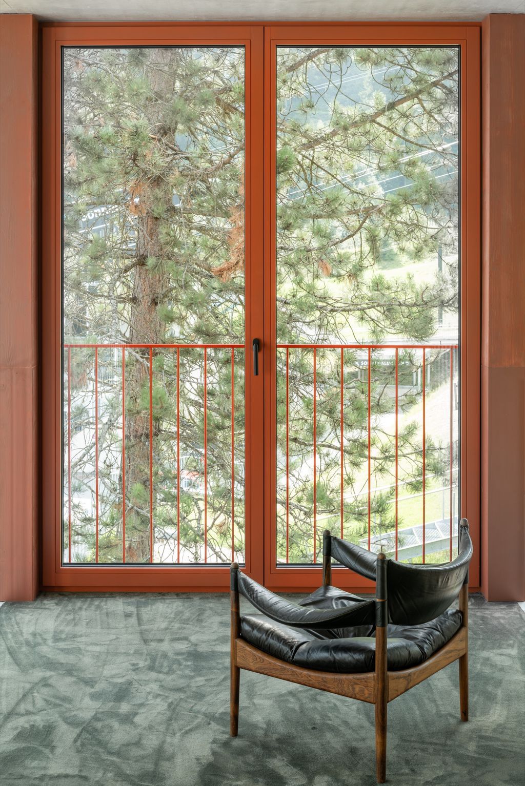 House Schmitten, A Vibrantly Red Alpine Chalet by Steiner Architecture