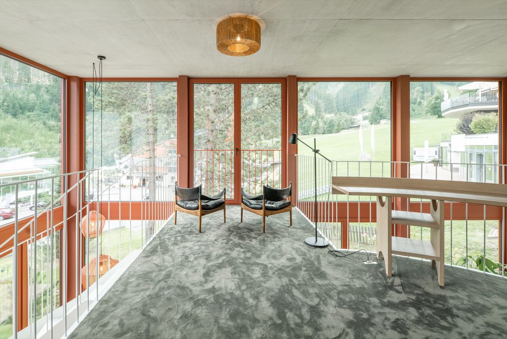 House Schmitten, A Vibrantly Red Alpine Chalet by Steiner Architecture