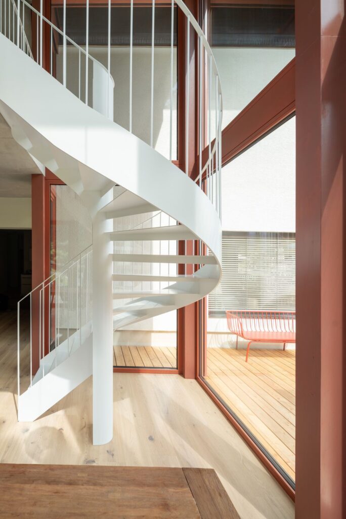 House Schmitten A Vibrantly Red Alpine Chalet by Steiner Architecture 14