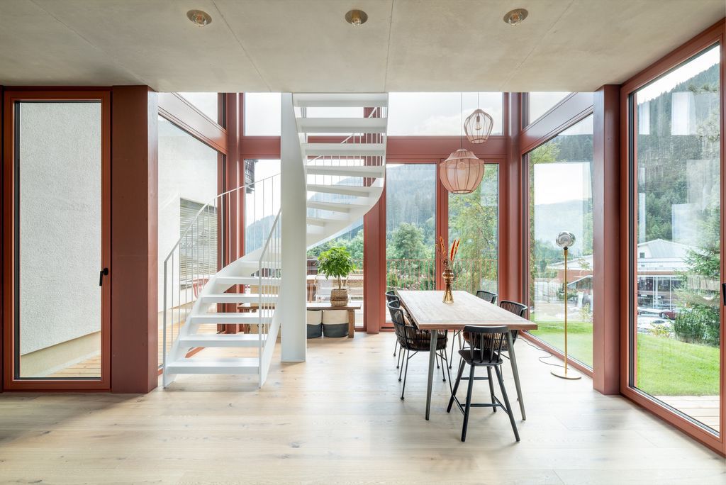 House Schmitten, A Vibrantly Red Alpine Chalet by Steiner Architecture