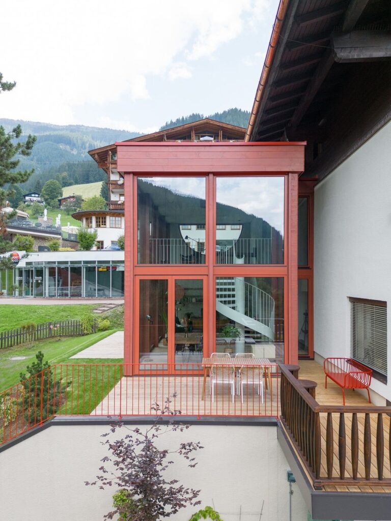 House Schmitten A Vibrantly Red Alpine Chalet by Steiner Architecture 3