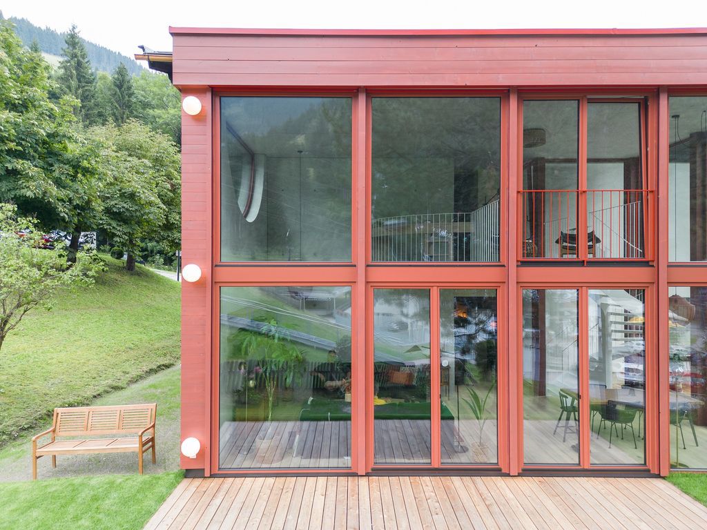 House Schmitten, A Vibrantly Red Alpine Chalet by Steiner Architecture
