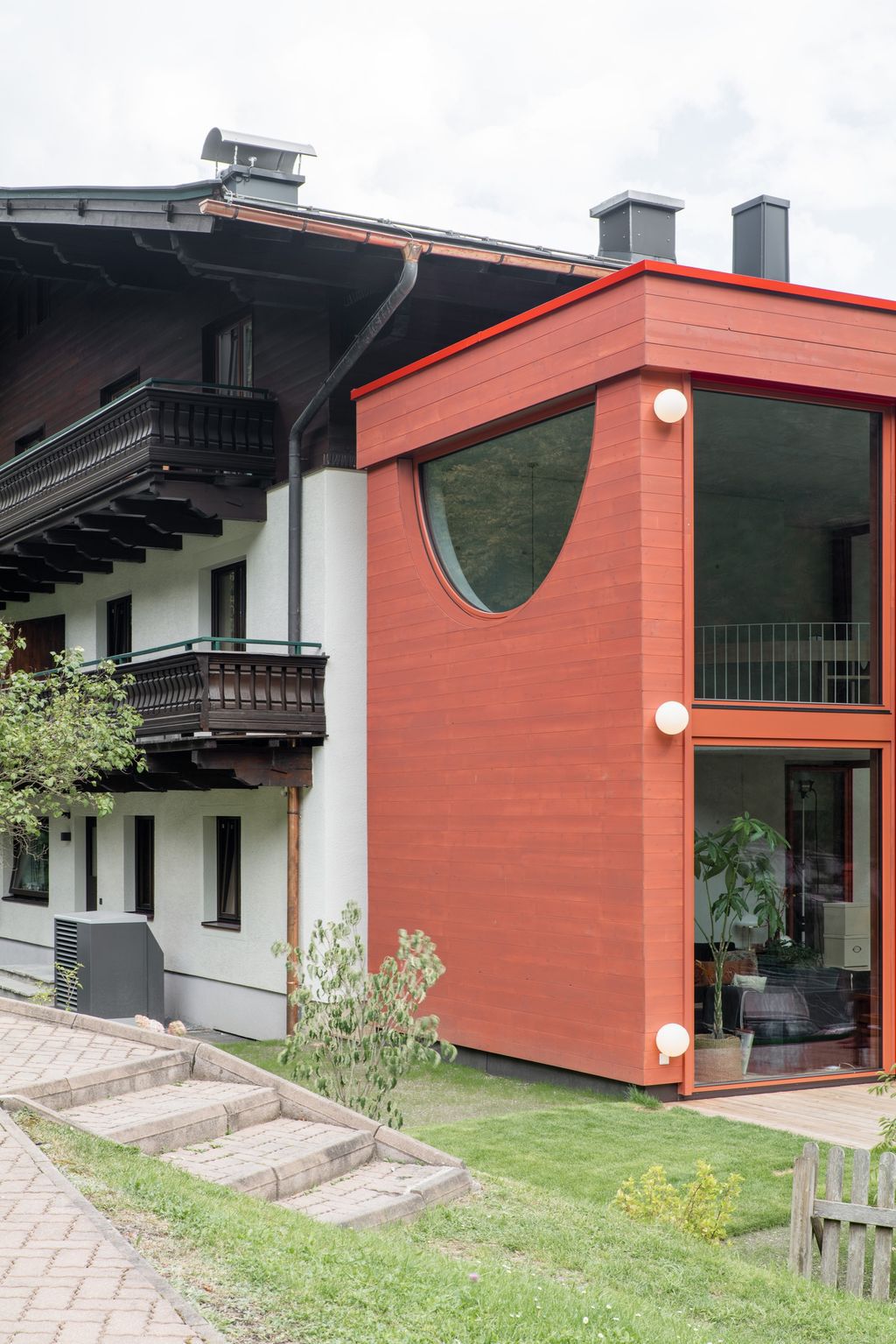 House Schmitten A Vibrantly Red Alpine Chalet by Steiner Architecture 6