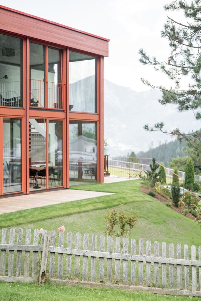 House Schmitten A Vibrantly Red Alpine Chalet by Steiner Architecture 7