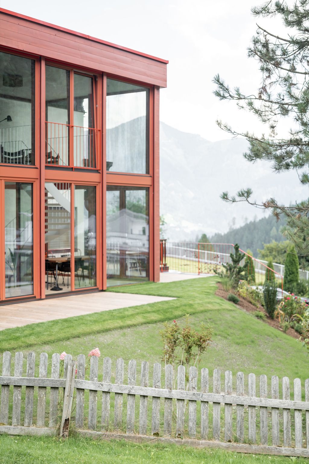 House Schmitten A Vibrantly Red Alpine Chalet by Steiner Architecture 7