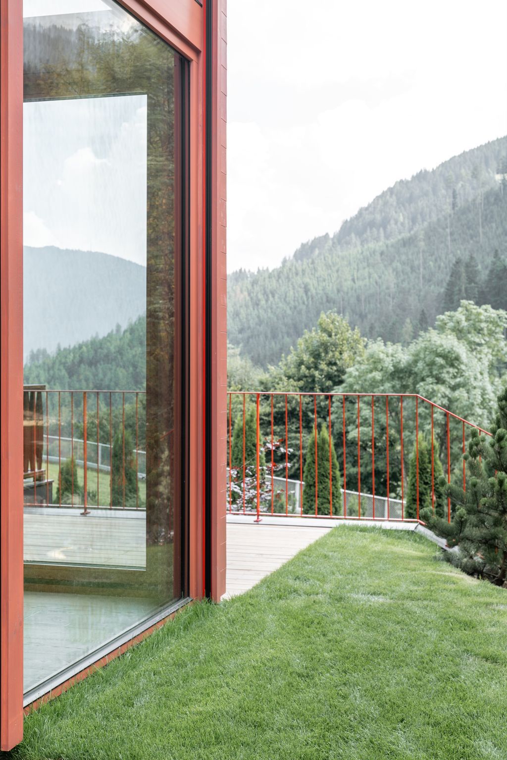 House Schmitten A Vibrantly Red Alpine Chalet by Steiner Architecture 8