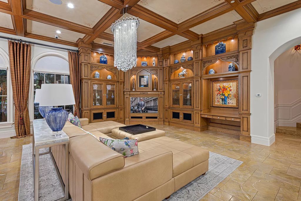 Nestled on a prime 1.06-acre waterfront estate at 5001 Egret Point Circle, Boca Raton, this Italianate marvel in The Sanctuary presents 8 bedrooms, 14 baths, and 14,848 square feet of opulent living space, meticulously crafted in 2005.