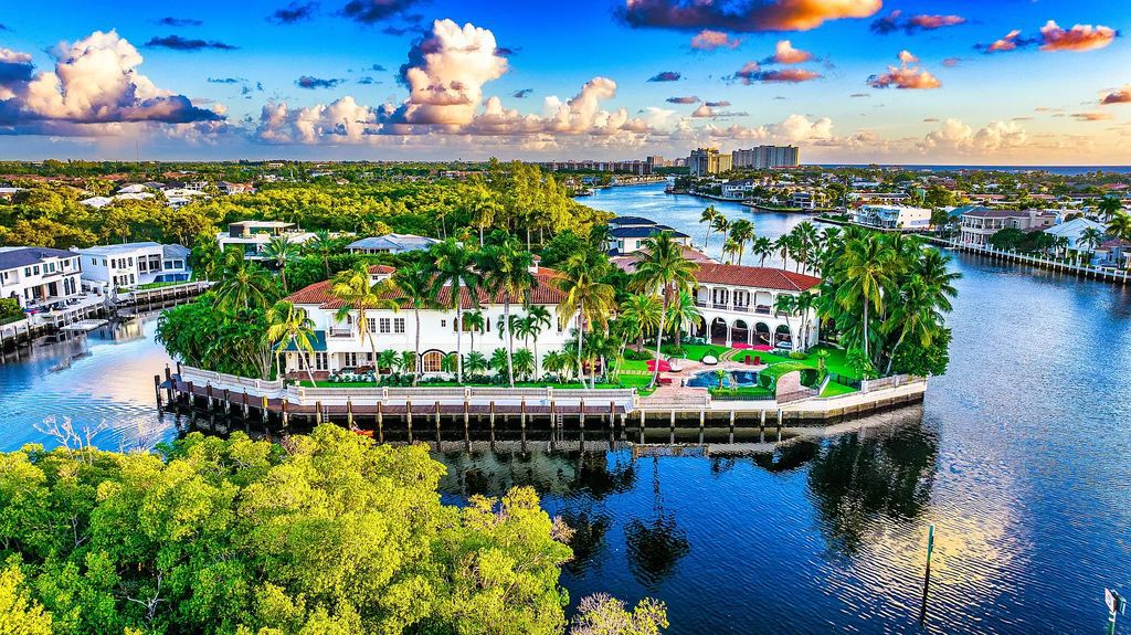 Nestled on a prime 1.06-acre waterfront estate at 5001 Egret Point Circle, Boca Raton, this Italianate marvel in The Sanctuary presents 8 bedrooms, 14 baths, and 14,848 square feet of opulent living space, meticulously crafted in 2005.