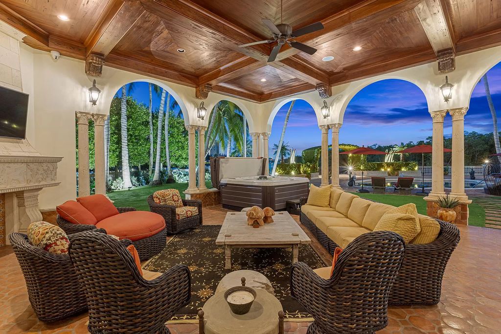 Nestled on a prime 1.06-acre waterfront estate at 5001 Egret Point Circle, Boca Raton, this Italianate marvel in The Sanctuary presents 8 bedrooms, 14 baths, and 14,848 square feet of opulent living space, meticulously crafted in 2005.