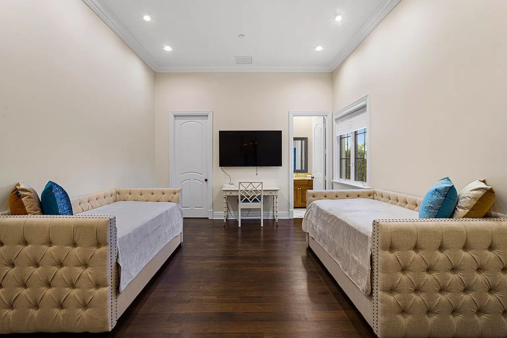 Nestled on a prime 1.06-acre waterfront estate at 5001 Egret Point Circle, Boca Raton, this Italianate marvel in The Sanctuary presents 8 bedrooms, 14 baths, and 14,848 square feet of opulent living space, meticulously crafted in 2005.