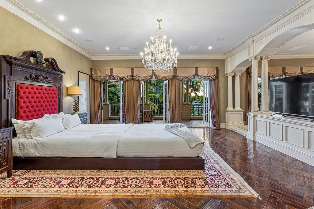 Nestled on a prime 1.06-acre waterfront estate at 5001 Egret Point Circle, Boca Raton, this Italianate marvel in The Sanctuary presents 8 bedrooms, 14 baths, and 14,848 square feet of opulent living space, meticulously crafted in 2005.