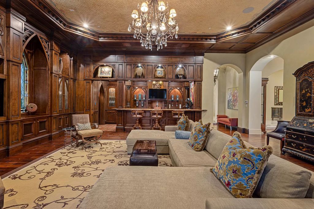 Nestled on a prime 1.06-acre waterfront estate at 5001 Egret Point Circle, Boca Raton, this Italianate marvel in The Sanctuary presents 8 bedrooms, 14 baths, and 14,848 square feet of opulent living space, meticulously crafted in 2005.